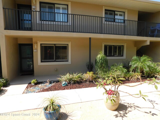 exterior space with stucco siding