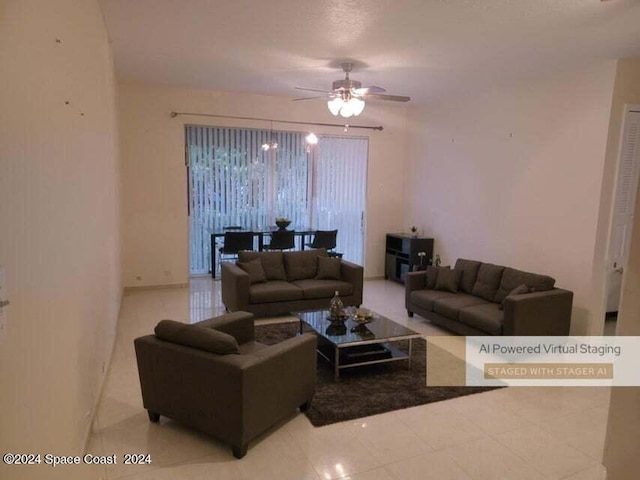 living area with ceiling fan