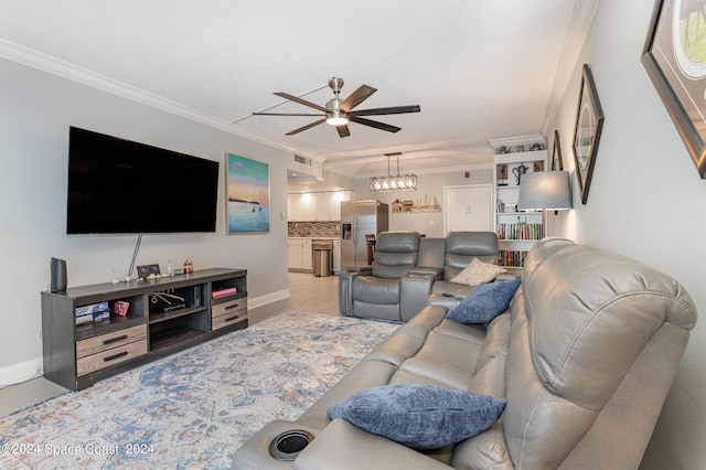 living room with crown molding and ceiling fan