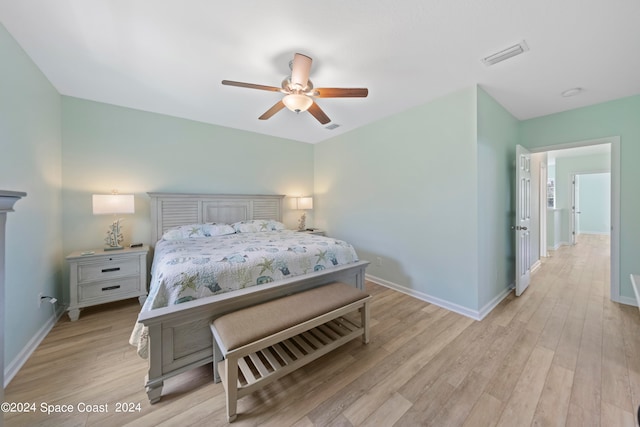 bedroom featuring light wood-type flooring and ceiling fan