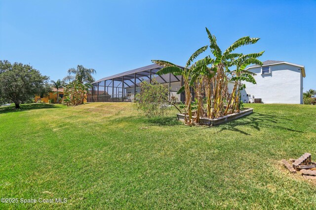 929 Hialeah St, Rockledge, FL 32955 - view of yard featuring a lanai