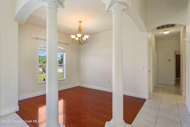 929 Hialeah St, Rockledge, FL 32955 - interior space with visible vents, baseboards, light wood finished floors, and arched walkways