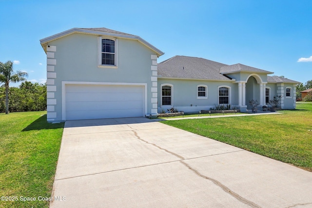 929 Hialeah St, Rockledge, FL 32955 - view of front of house with a garage, stucco siding, concrete driveway, and a front yard