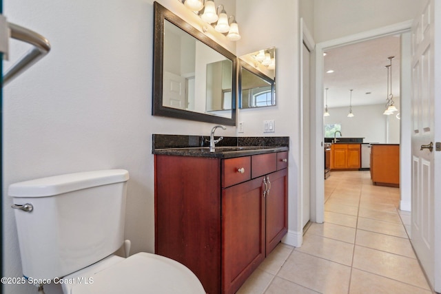 929 Hialeah St, Rockledge, FL 32955 - bathroom with tile patterned floors, vanity, and toilet