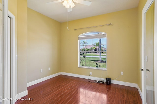 929 Hialeah St, Rockledge, FL 32955 - unfurnished room with wood finished floors, baseboards, and a ceiling fan
