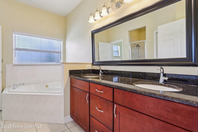 929 Hialeah St, Rockledge, FL 32955 - bathroom with a stall shower, a garden tub, double vanity, and a sink