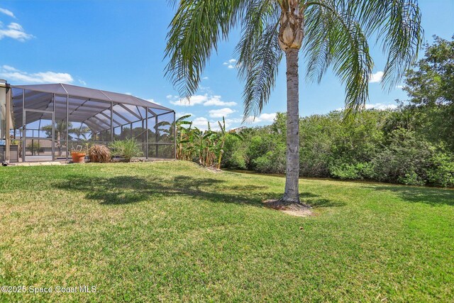 929 Hialeah St, Rockledge, FL 32955 - view of yard with a lanai