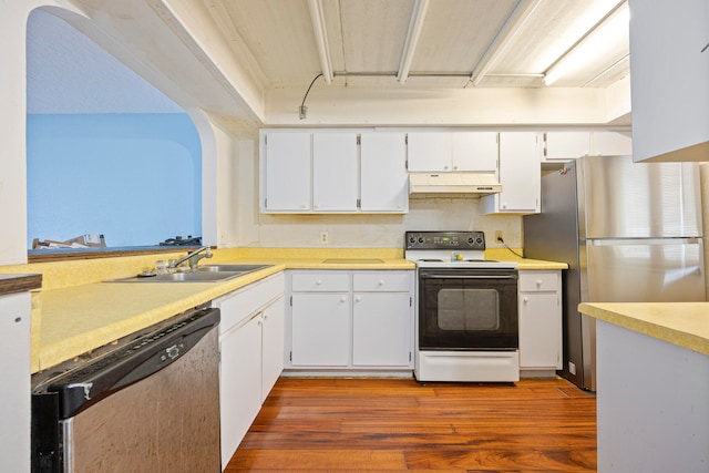 kitchen featuring sink, dark wood-type flooring, stainless steel appliances, and white cabinets