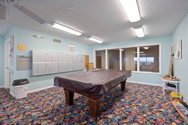 game room featuring a textured ceiling, billiards, mail boxes, and carpet flooring