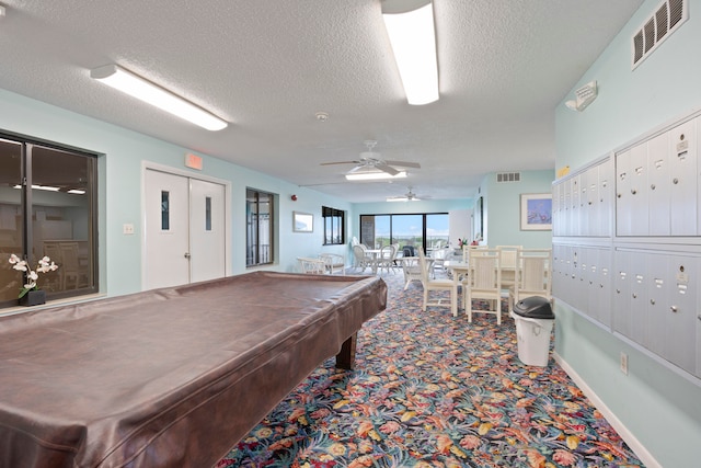 rec room featuring ceiling fan, mail boxes, a textured ceiling, carpet, and billiards