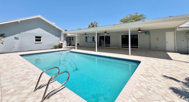 view of pool featuring ceiling fan and a patio area