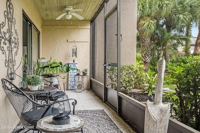 balcony featuring ceiling fan and a patio area