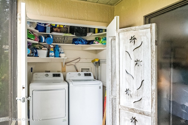 laundry area with washer and dryer