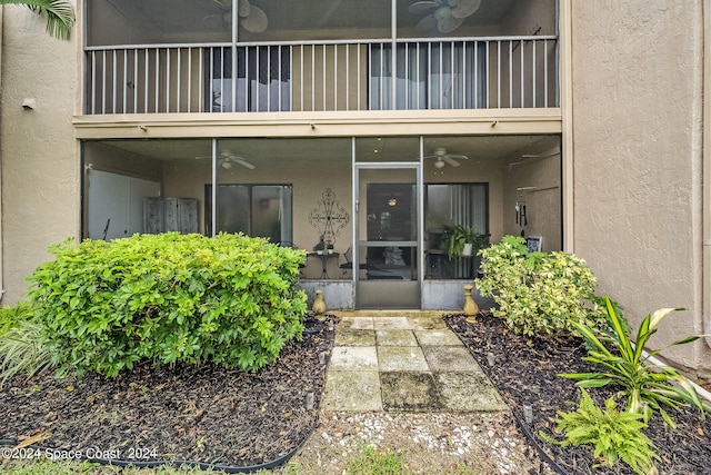 entrance to property featuring a balcony