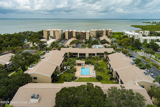 drone / aerial view with a water view