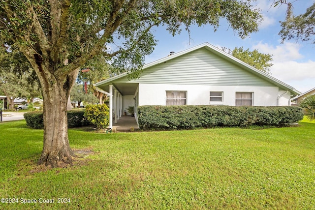 exterior space featuring a front lawn