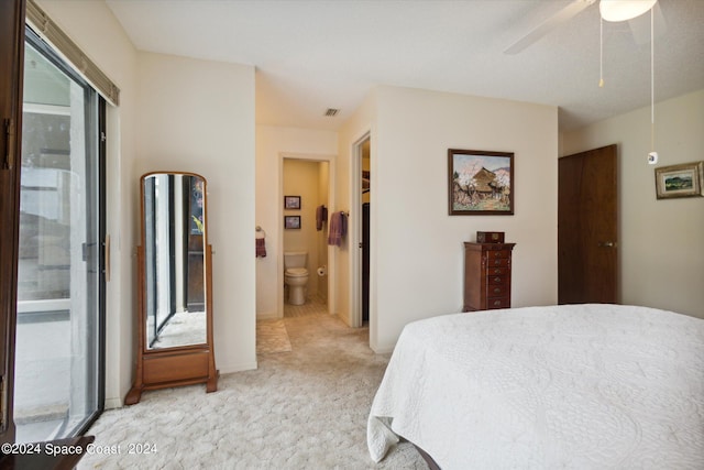 carpeted bedroom with ceiling fan, connected bathroom, and access to outside