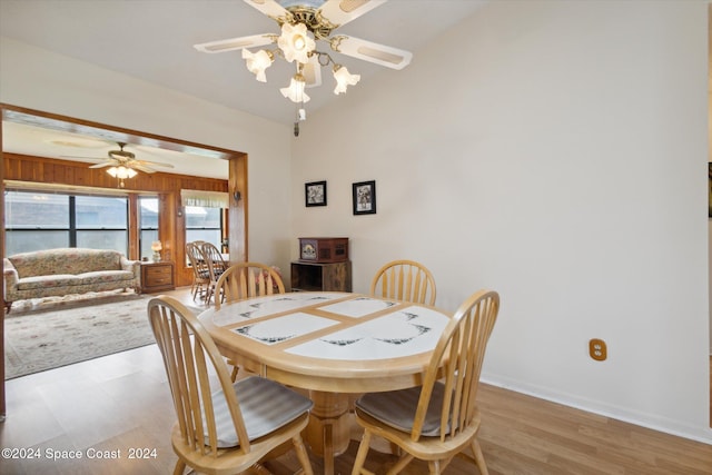 dining space featuring ceiling fan and light hardwood / wood-style floors