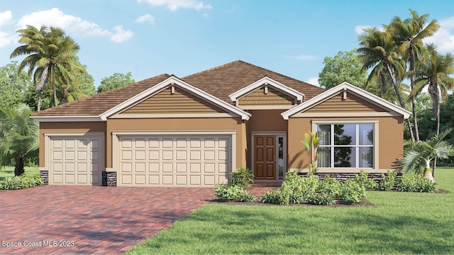 view of front of property featuring a garage and a front lawn