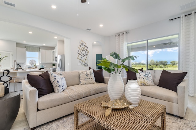 living room with ceiling fan