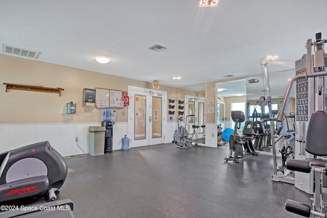 gym with french doors