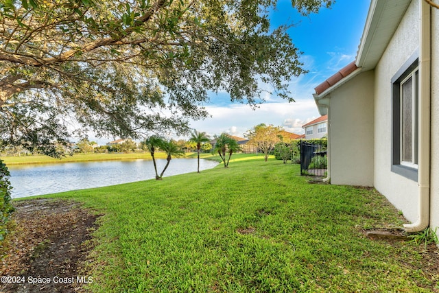 view of yard with a water view