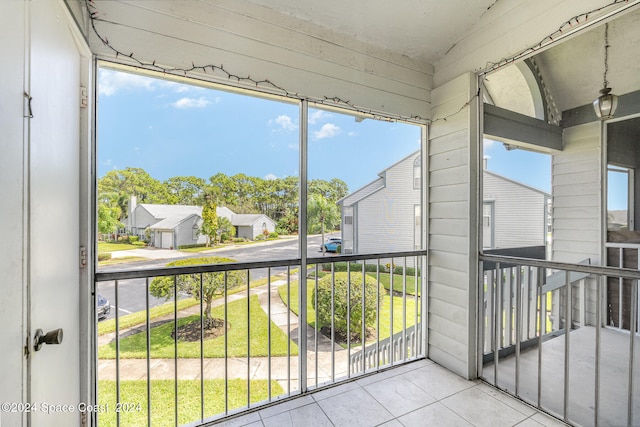 unfurnished sunroom with a healthy amount of sunlight