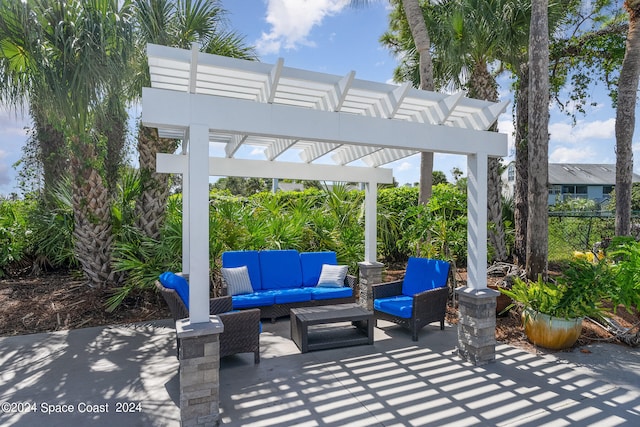 view of patio featuring outdoor lounge area and a pergola