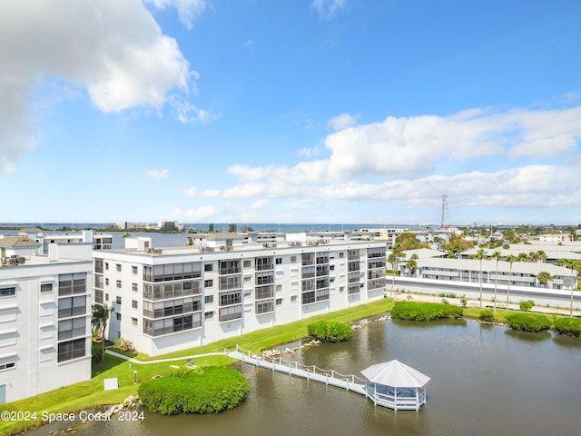 birds eye view of property featuring a water view