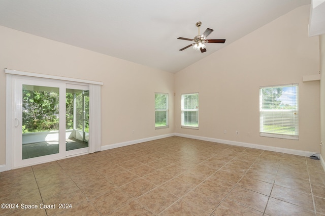 unfurnished room featuring light tile patterned flooring, ceiling fan, and high vaulted ceiling