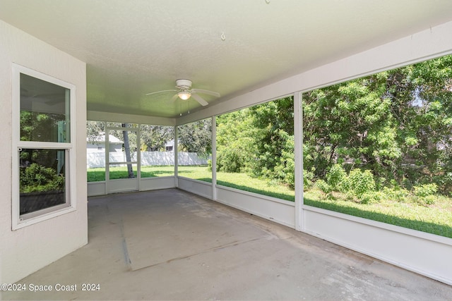 1290 Mercedes Dr, Merritt Island, FL 32952 - unfurnished sunroom featuring ceiling fan