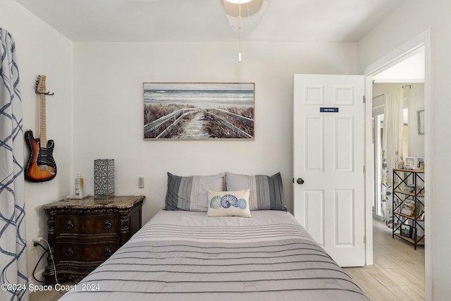 bedroom with light hardwood / wood-style floors