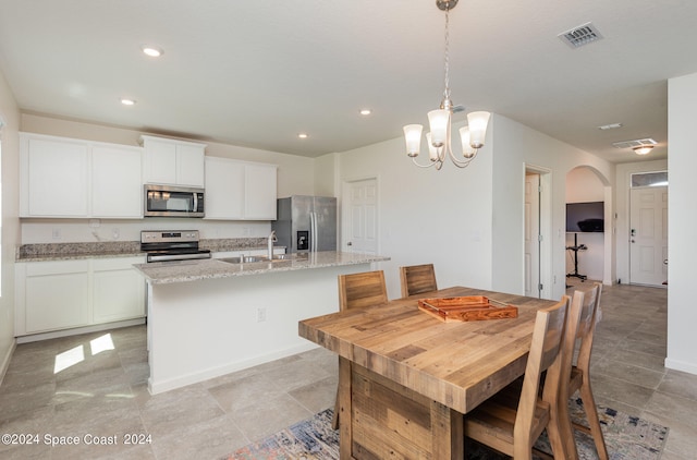 dining area featuring sink