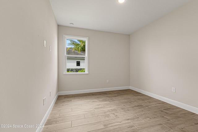 empty room with light wood-type flooring