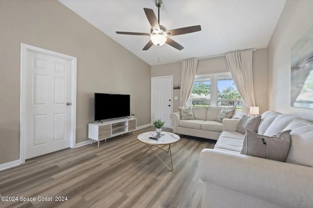 902 Beaverdale Ln, Rockledge, FL 32955 - living area featuring lofted ceiling, wood finished floors, ceiling fan, and baseboards
