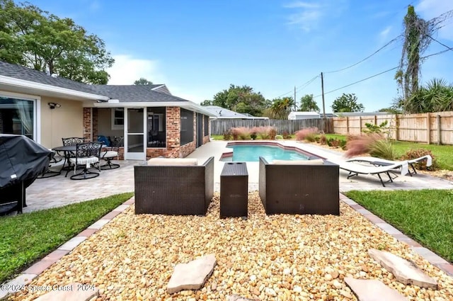 902 Beaverdale Ln, Rockledge, FL 32955 - view of swimming pool featuring a fenced in pool, a patio area, a sunroom, and a fenced backyard