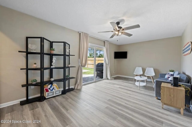 902 Beaverdale Ln, Rockledge, FL 32955 - home office featuring baseboards, wood finished floors, and ceiling fan