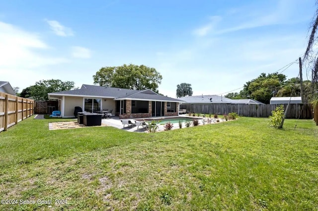 902 Beaverdale Ln, Rockledge, FL 32955 - back of property with a patio, a fenced in pool, a fenced backyard, and a yard