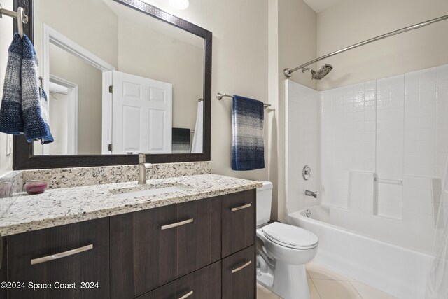 full bathroom with vanity, tile patterned floors, shower / washtub combination, and toilet