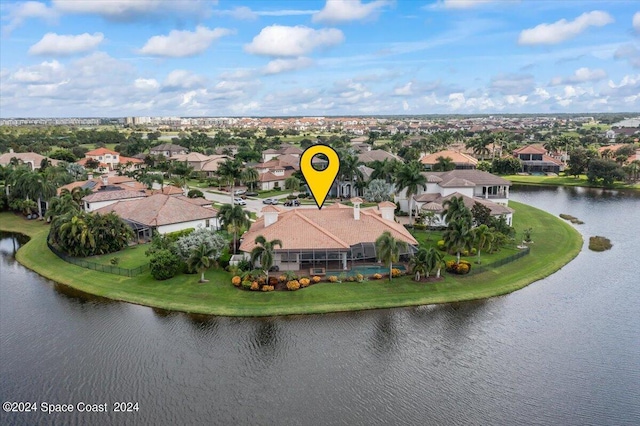 drone / aerial view featuring a water view