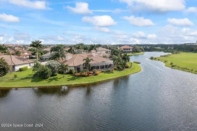 bird's eye view with a water view