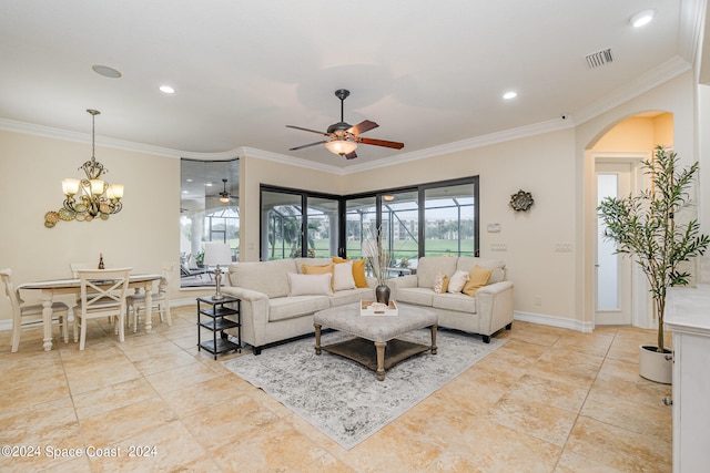 living room with ornamental molding and ceiling fan with notable chandelier