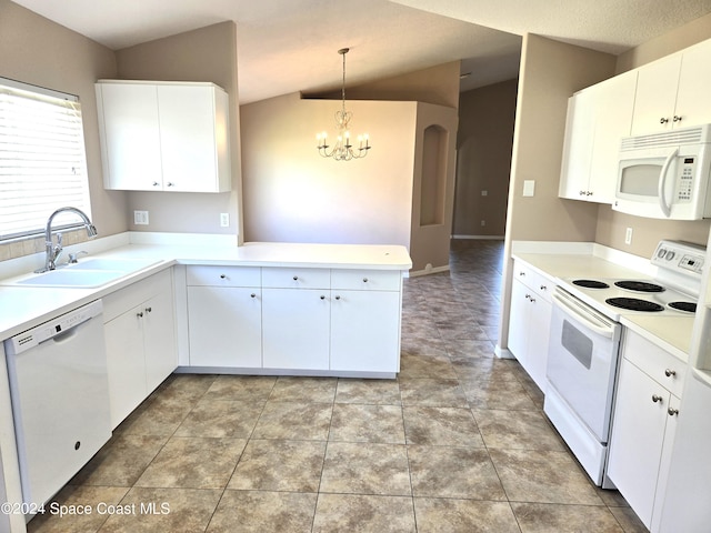 kitchen featuring kitchen peninsula, sink, pendant lighting, white cabinets, and white appliances