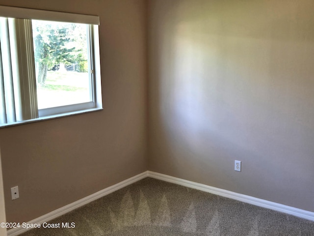 empty room with carpet floors