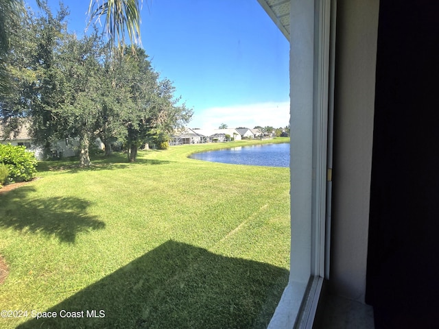 view of yard with a water view