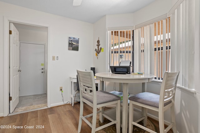 dining space featuring light hardwood / wood-style floors