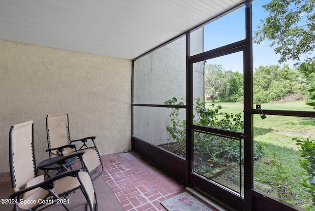 unfurnished sunroom featuring a wealth of natural light