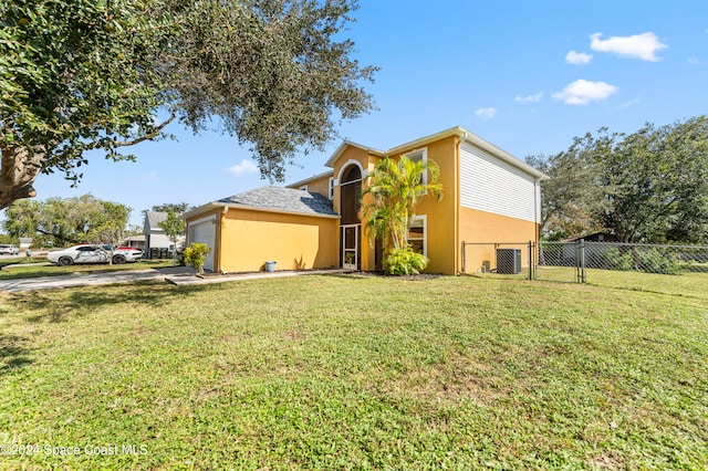 view of front of home with a front lawn