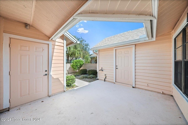 doorway to property featuring a patio area