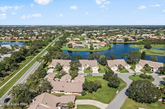 drone / aerial view featuring a water view